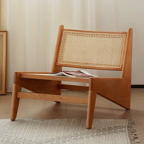 Oakley chair with woven rattan details.