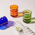 4 bubble glasses on table