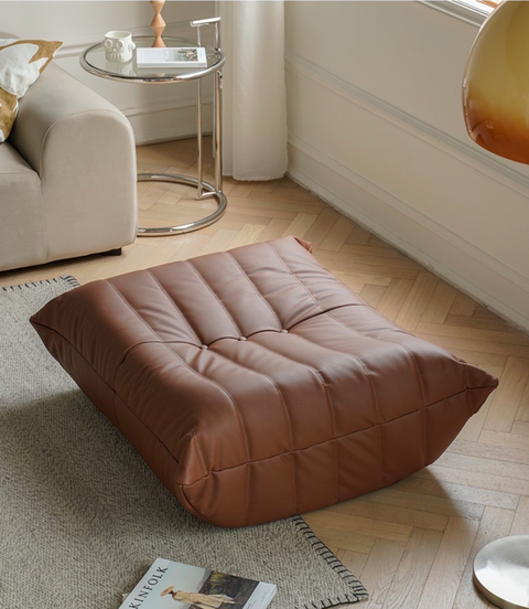 Leather-look foot stool.