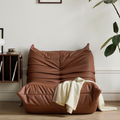 Leather-look slouch couch chair.