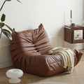 Leather-look slouch couch chair.