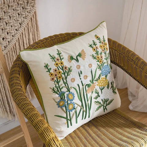 
Embroidered pillow on chair