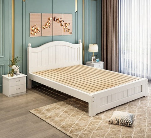 Wooden bed frame in bedroom.