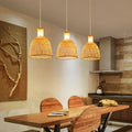 Selection of bamboo chandeliers above table.