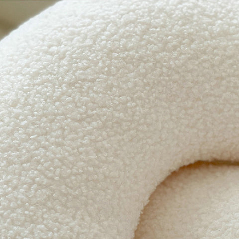 Close-up of abstract-shaped pillow.