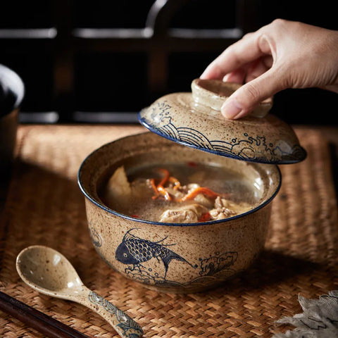 Ramen bowl filled with food with lid on table