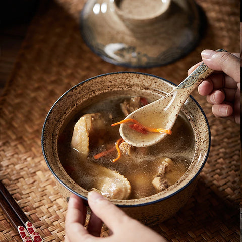 Ramen bowl with food and ladle