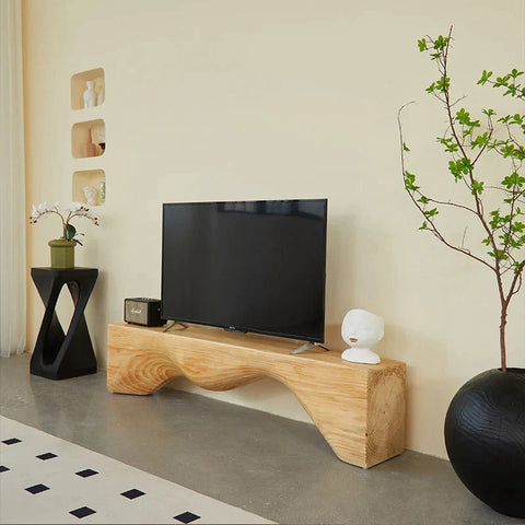 wooden bench used as tv stand 