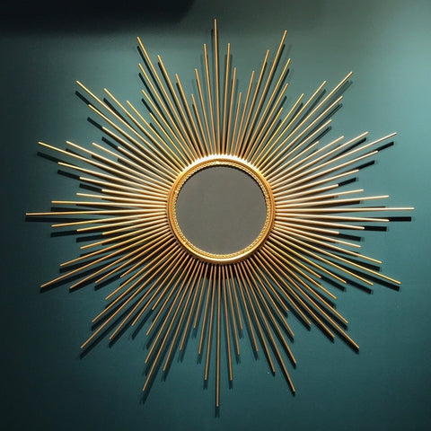 Mirror with star-shaped frame.