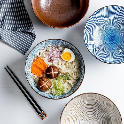 Round ceramic bowls with food.