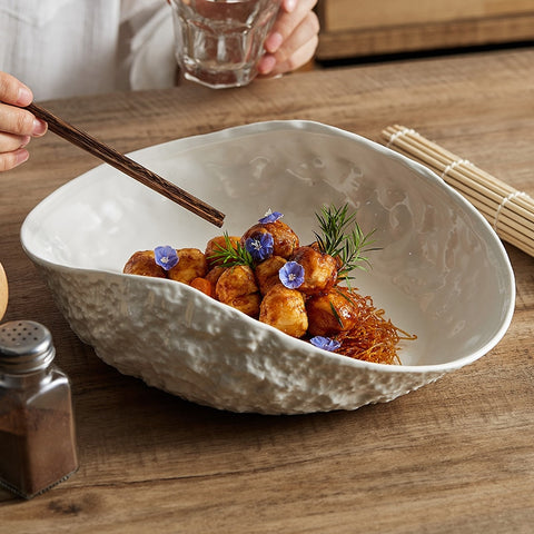 Ceramic bowl with food.