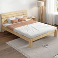 Wooden bed frame with slats in bedroom.